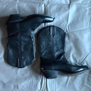 Vintage boots with some really cool designs on them.